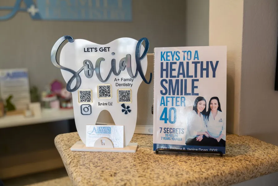 A sign that says "keys to a healthy smile after 40"